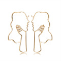 Retro ethnic style alloy jewelry, simple female face symmetrical earrings